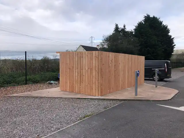 Cycle Store Clad in PAR 188 British Cedar PAR cycle store by Co2 Timber