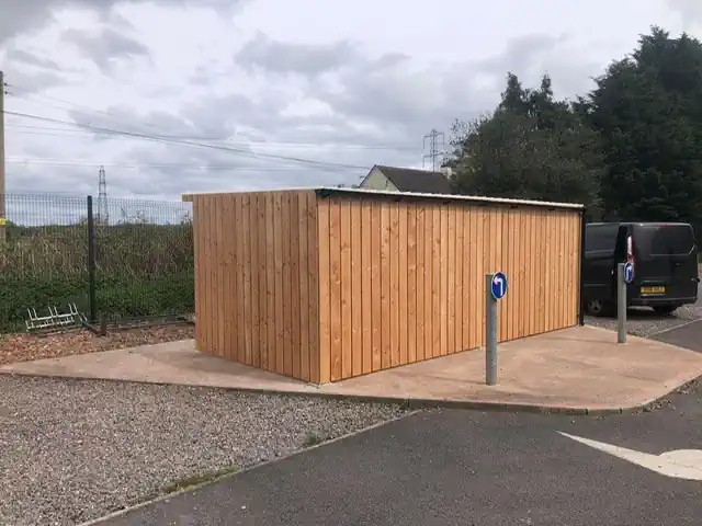 Cycle Store Clad in PAR 190 British Cedar PAR cycle store by Co2 Timber Back